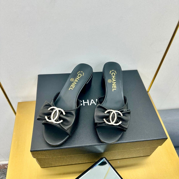 cc 25 bow mule sandal 50mm black sheepskin 238478