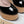 ALAIA WEDGE SANDAL IN BLACK GLOSSY CALFSKIN AND BEIGE RUBBER
