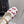 LV Romy Flat Cherry White Monogram Cowhide 610856