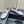 ALAIA CRYSTAL EMBELLISHED BALLET FLATS IN SILVER CALFSKIN