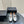 ALAIA CRYSTAL EMBELLISHED BALLET FLATS IN SILVER CALFSKIN