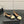 Alaia 2025 Ballet Flat Beige Black Raffia 433754