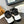 CHLOÉ NAMA WEDGE SANDALS IN BLACK FABRIC AND WHITE RUBBER