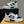 LV TRAINER SNEAKERS IN WHITE CALFSKIN AND BLACK SUEDE