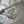 DRAWSTRING BUCKET BACKPACK 24 IN SILVER-TONE LAMBSKIN SILVER HARDWARE
