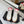 MID-TOP SNEAKERS IN WHITE AND RED TRIM PERFORATED LAMBSKIN