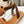 LYMPIA SANDAL IN TRIOMPHE MACCRAMÉ COTTON & CALFSKIN BROWN/DARK BROWN