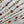 LV 25 Decorative Pattern Gemstone Chain Pleated Skirt White Poliester