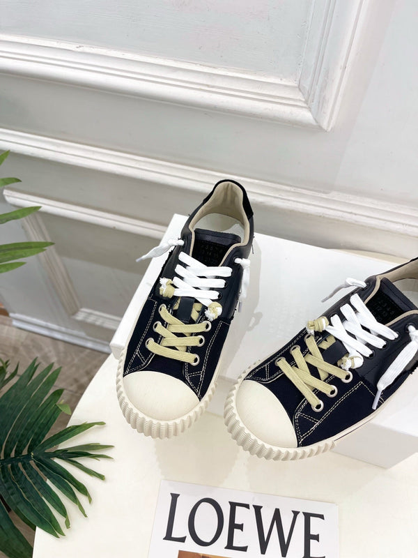 MM 26s New Evolution Sneakers Black Canvas Calfskin 947483