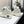 CC 26s Casual Sneakers Ivory Black Fabric Sheepskin 626369