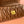 CHAIN SHOULDER BAG 24 IN BROWN PATENT SMOOTH LAMBSKIN
