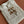WANDER BUCKET BAG 23 WHITE IN RAFFIA WITH LEATHER TRIM
