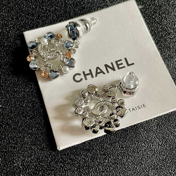 DOUBLE C STUD EARRINGS IN SILVER METAL WHITE PEARL GOLD AND BLUE STONES
