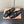 BOW MULES IN BLACK SHEEPSKIN