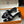HM 25S ORAN HIGH‑HEEL SANDAL 50 MM IN BLACK LAMBSKIN WITH WHITE STONE DETAILS