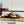 THONG SANDALS IN RED LAMBSKIN WITH GOLD HARDWARE
