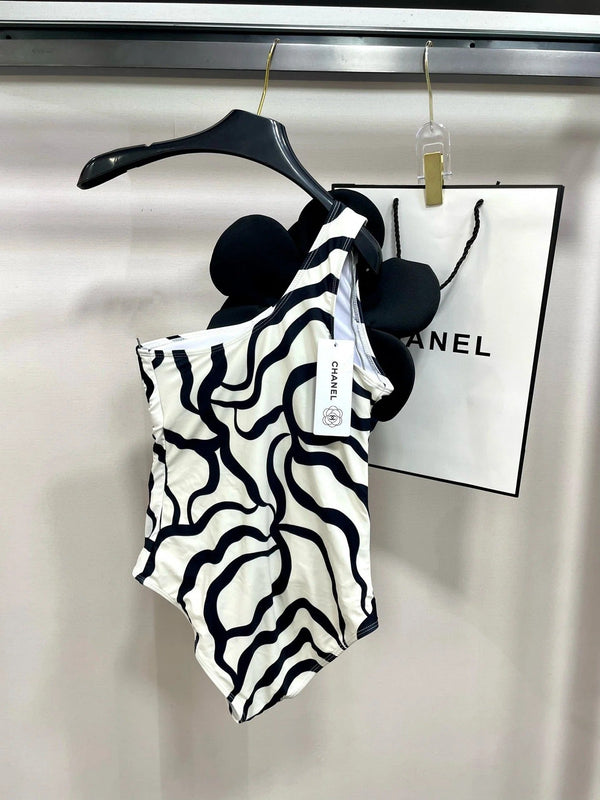 ONE-PIECE SWIMSUIT WITH FLORAL PATTERN IN BLACK AND WHITE 627827