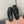 BOW MULES IN BLACK SHEEPSKIN