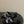 HM 25S ORAN HIGH‑HEEL SANDAL 50 MM IN BLACK LAMBSKIN WITH WHITE STONE DETAILS
