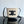 SMALL BUCKET CUIR TRIOMPHE 24CM IN STRIPED TEXTILE AND BLACK CALFSKIN