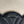 SMALL BUCKET CUIR TRIOMPHE 24CM IN STRIPED TEXTILE AND BLACK CALFSKIN