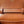 TEEN TRIOMPHE 11CM BROWN MONOGRAM CALFSKIN